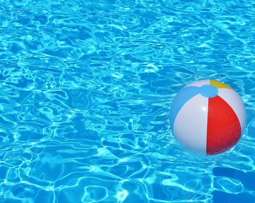 colorful inflatable ball floating in swimming pool